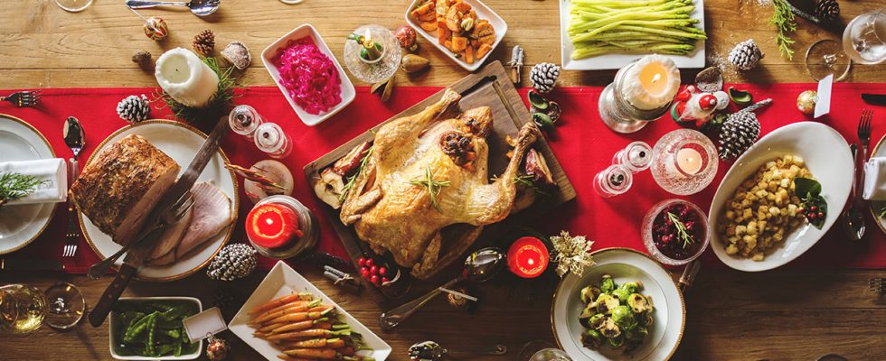 full thanksgiving meal on top of wooden table