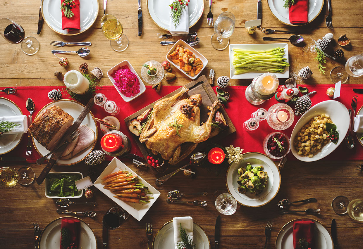 full thanksgiving meal on top of wooden table