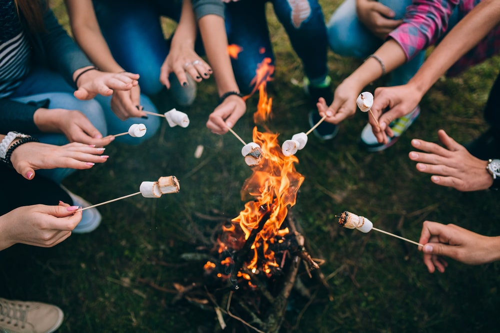 celebrating 4th of July with marshmallows roasted over a fire